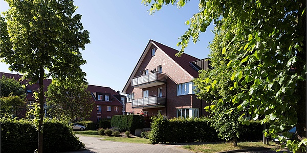 Hier sehen Sie das Mehrfamilienhaus in Hamburg-Neugraben